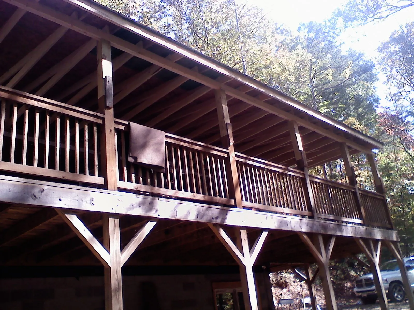 Timber framing under a new elevated porch and deck — Roof Leak Repair in Speonk by Roofing Brothers